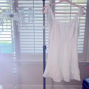 New with tags. Lulus Flow it out white Embroidered Tie Strap mini Dress!